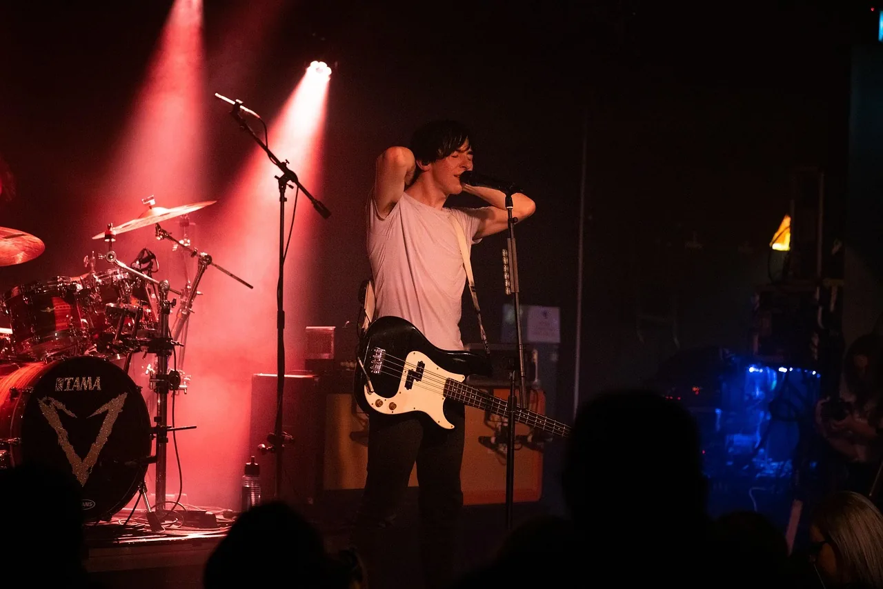 Bass player on stage at a rock concert Bass player on stage at a rock concert