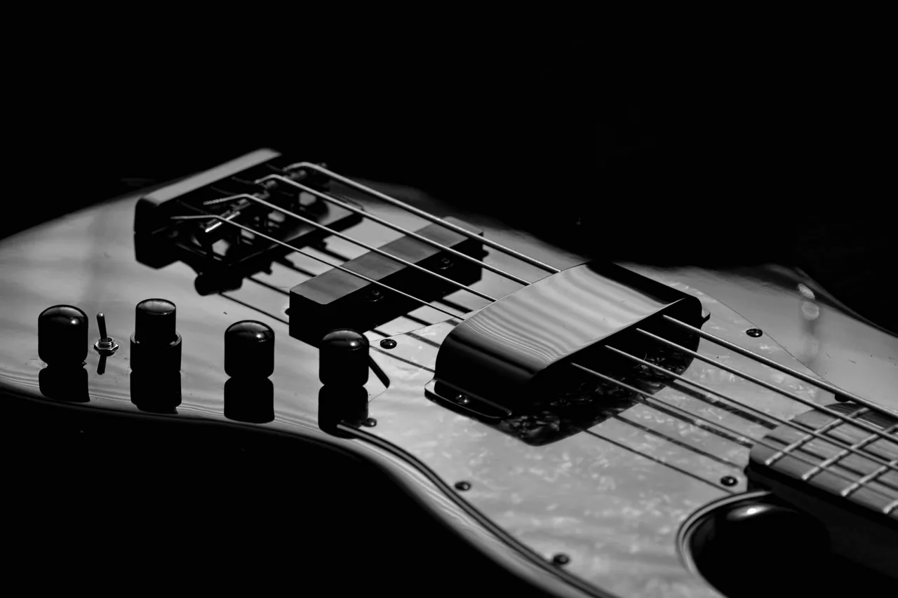 Close-up of an electric bass guitar Close-up of an electric bass guitar