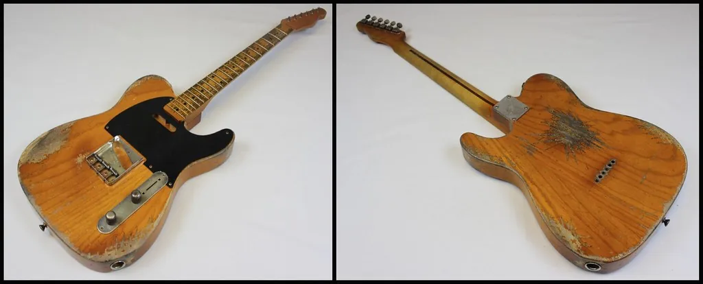 Heavily worn vintage electric guitar Heavily worn vintage electric guitar