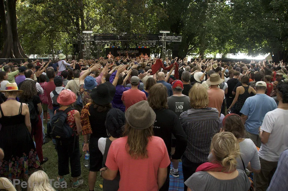 Audience in front of a festival stage Audience in front of a festival stage