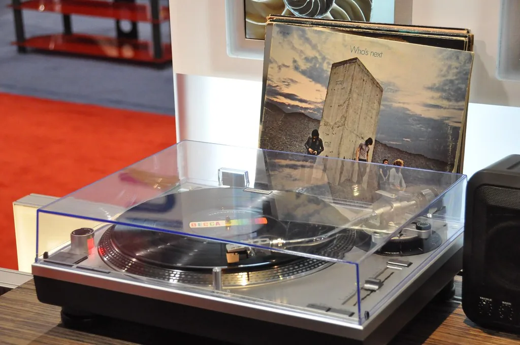 Vintage rock album on a vinyl turntable Vintage rock album on a vinyl turntable