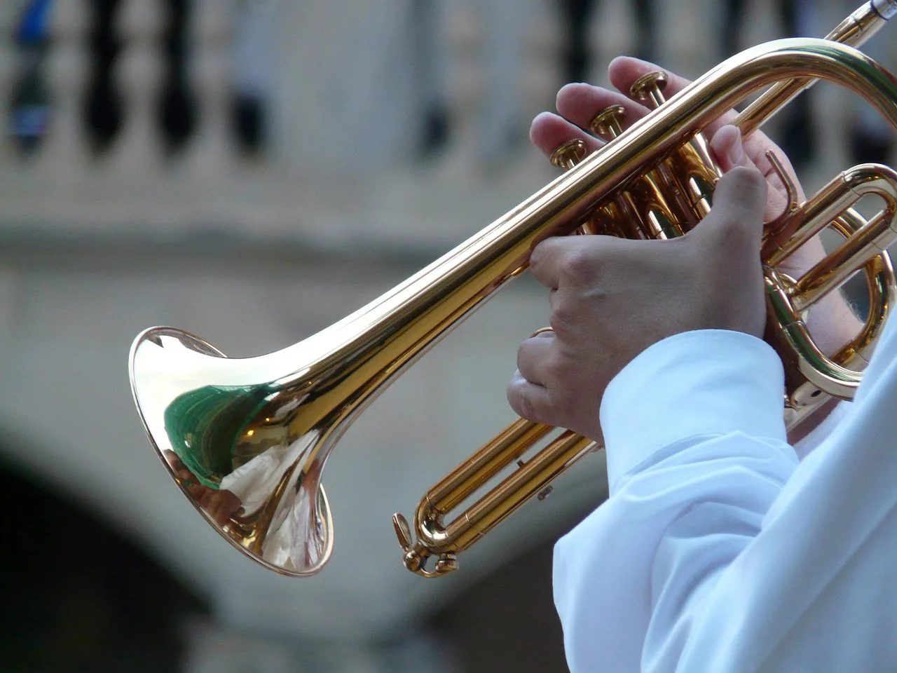 Musician playing the trumpet Musician playing the trumpet