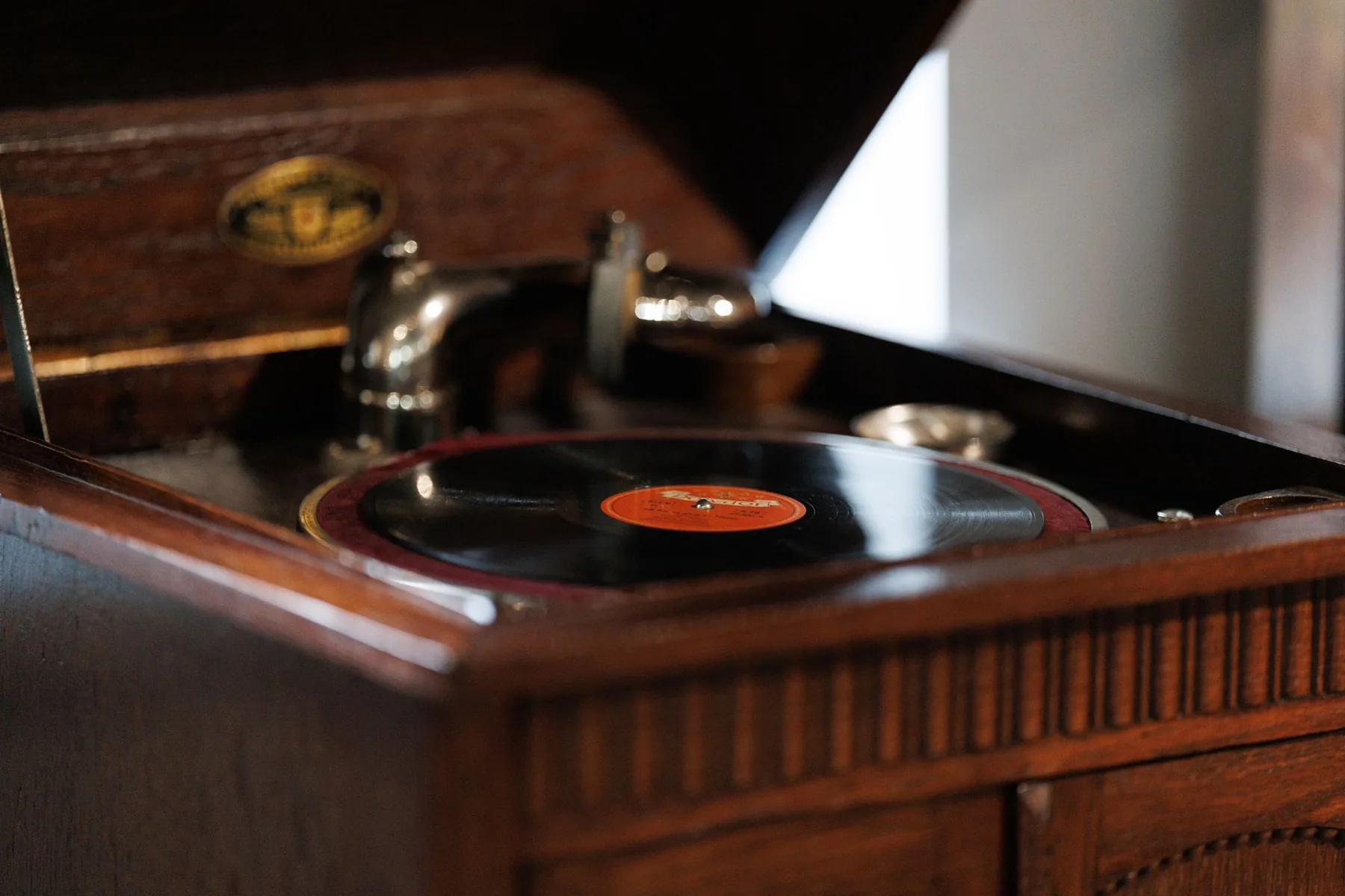 Vinyl record on an antique gramophone Vinyl record on an antique gramophone