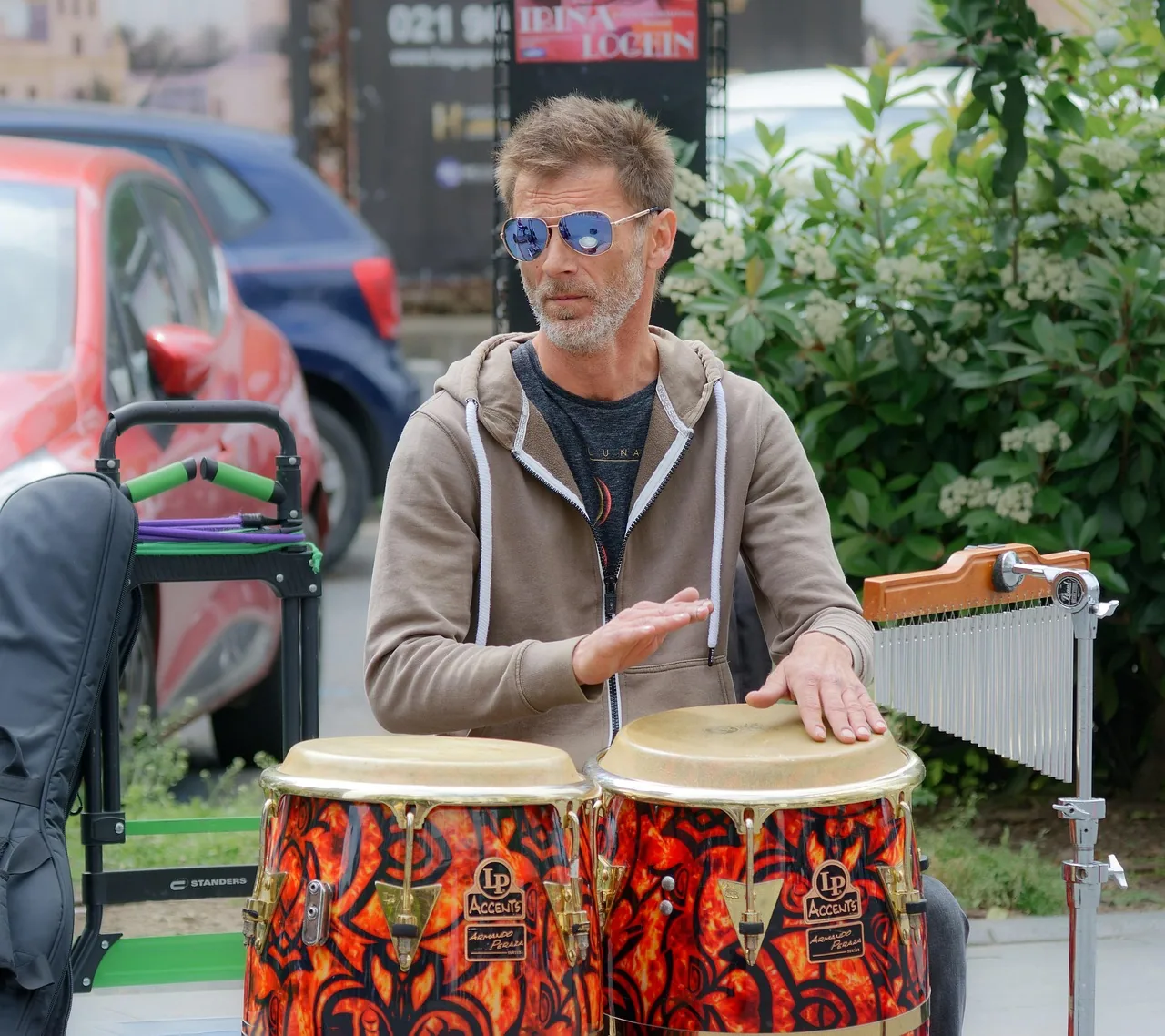 Street percussionist playing congas Street percussionist playing congas